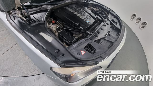 BMW 7 Series (F01) 730d 2011 — фото 6