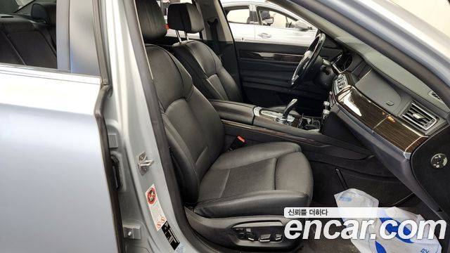 BMW 7 Series (F01) 740d xDrive 2015 — фото 11