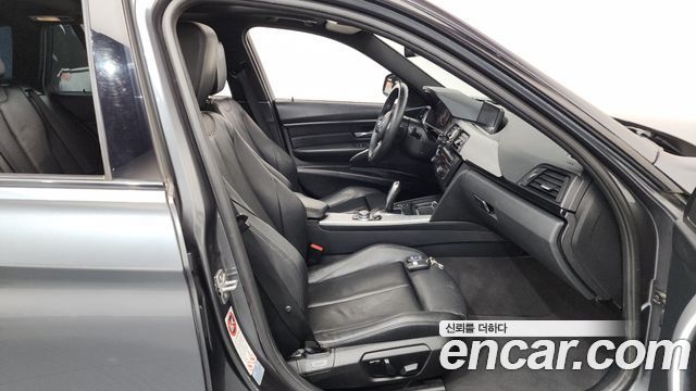 BMW 3 Series (F30) 320d xDrive Touring M Sport 2013 — фото 11