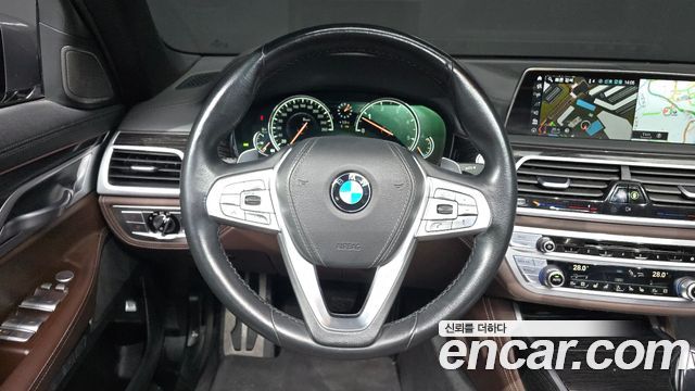 BMW 7 Series (G11) 740d xDrive M Sport 2017 — фото 13