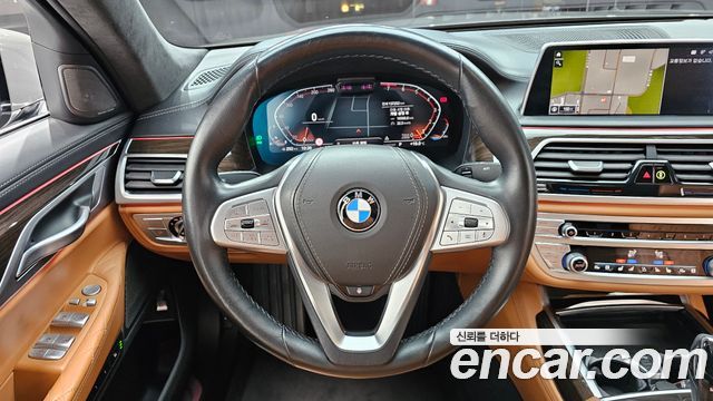 BMW 7 Series (G11) 740Li xDrive Design Pure Excellence 2021 — фото 14