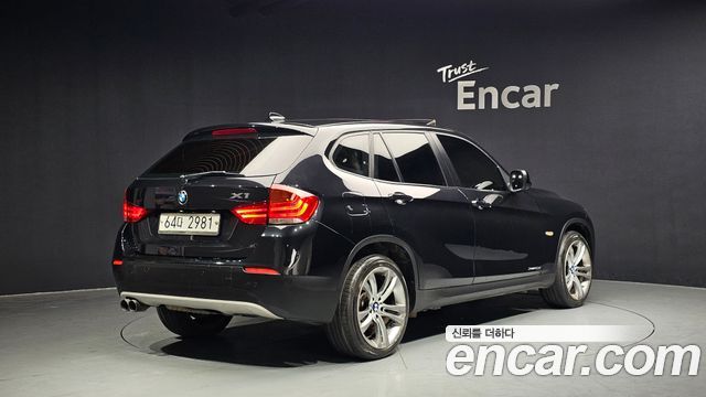 BMW X1 (E84) xDrive 20d 2011 — фото 2