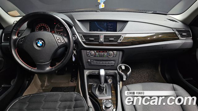 BMW X1 (E84) xDrive 20d 2011 — фото 7