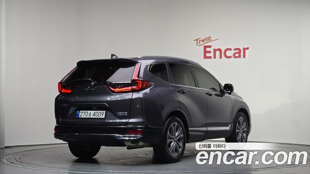 Honda CR-V (V) 2.0 Hybrid Touring 4WD 2022 — фото 2
