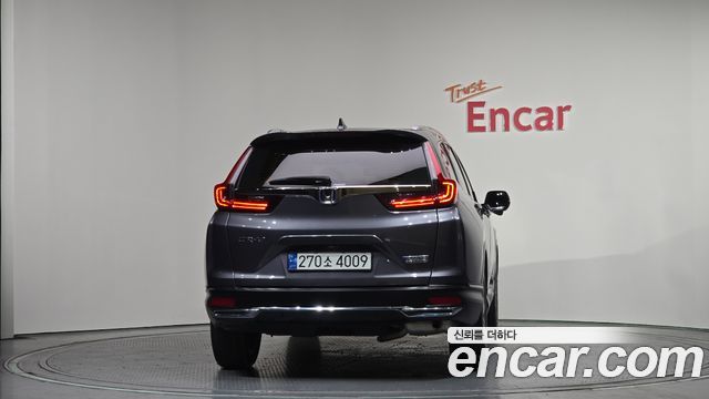Honda CR-V (V) 2.0 Hybrid Touring 4WD 2022 — фото 4