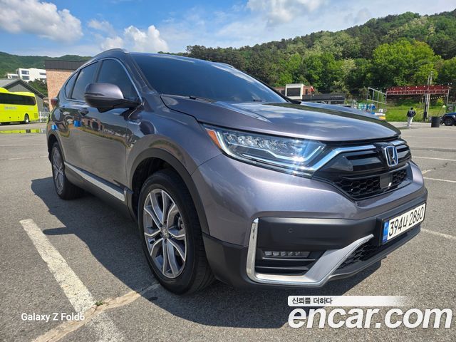 Honda CR-V (V) 2.0 Hybrid Touring 4WD 2021 — фото 2