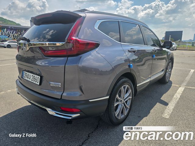 Honda CR-V (V) 2.0 Hybrid Touring 4WD 2021 — фото 7