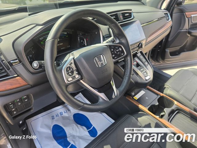 Honda CR-V (V) 2.0 Hybrid Touring 4WD 2021 — фото 9