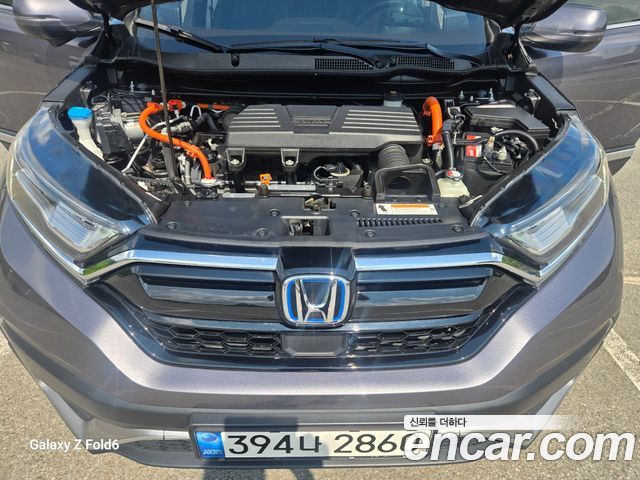 Honda CR-V (V) 2.0 Hybrid Touring 4WD 2021 — фото 21