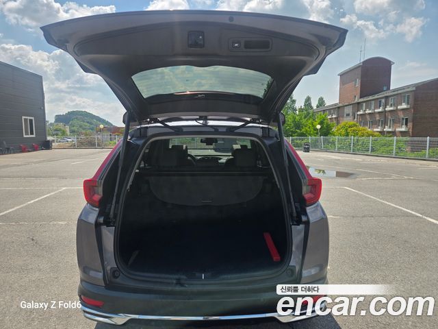 Honda CR-V (V) 2.0 Hybrid Touring 4WD 2021 — фото 23