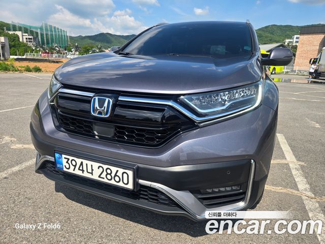 Honda CR-V (V) 2.0 Hybrid Touring 4WD 2021 — фото 24