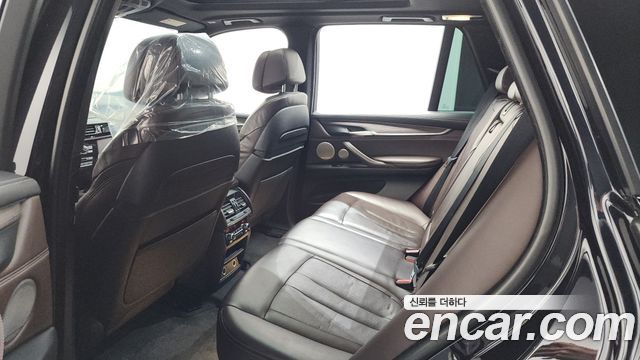 BMW X5 (F15) xDrive M50d 2016 — фото 11