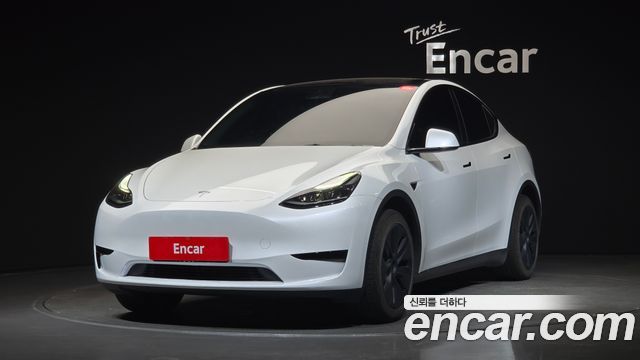Tesla Model Y RWD 2024 — фото 1