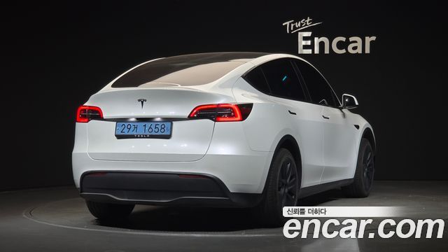 Tesla Model Y RWD 2024 — фото 2