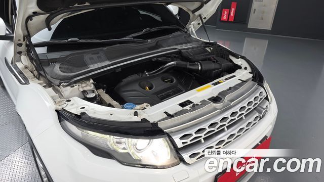 Land Rover Range Rover Evoque 2.0 Si4 Prestige 2013 — фото 6