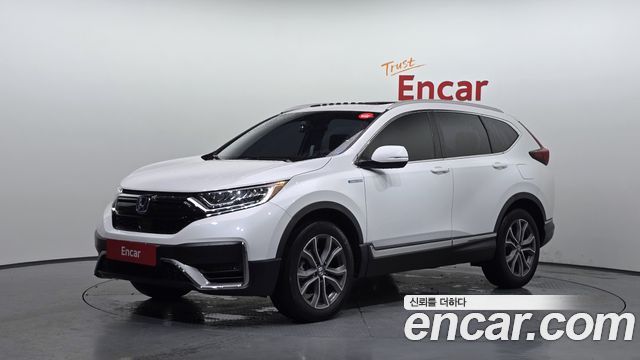 Honda CR-V (V) 2.0 Hybrid Touring 4WD 2021 — фото 1