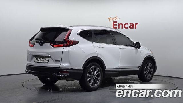 Honda CR-V (V) 2.0 Hybrid Touring 4WD 2021 — фото 2