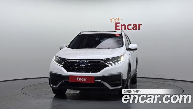 Honda CR-V (V) 2.0 Hybrid Touring 4WD 2021 — фото 3