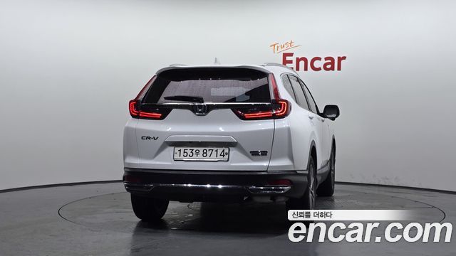 Honda CR-V (V) 2.0 Hybrid Touring 4WD 2021 — фото 4