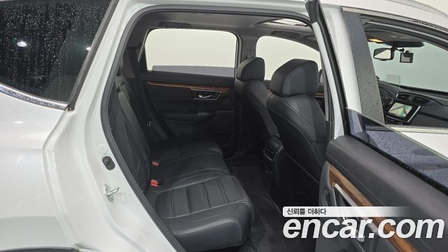 Honda CR-V (V) 2.0 Hybrid Touring 4WD 2021 — фото 11
