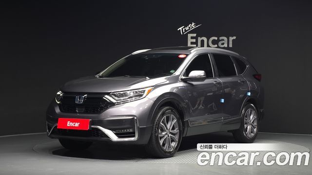 Honda CR-V (V) 2.0 Hybrid Touring 4WD 2022 — фото 1