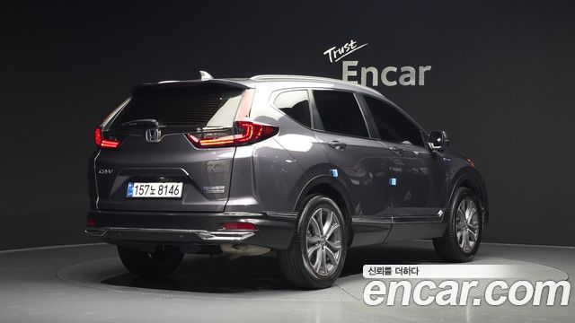 Honda CR-V (V) 2.0 Hybrid Touring 4WD 2022 — фото 2