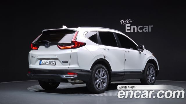 Honda CR-V (V) 2.0 Hybrid Touring 4WD 2022 — фото 2