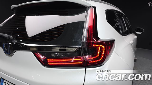 Honda CR-V (V) 2.0 Hybrid Touring 4WD 2022 — фото 23