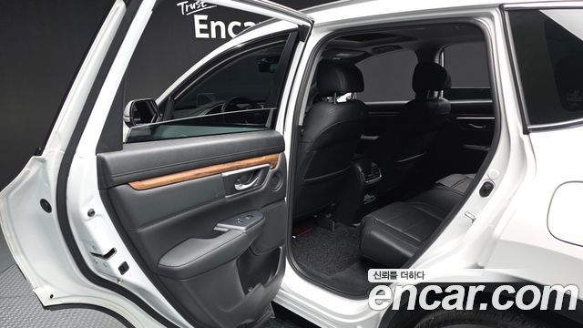 Honda CR-V (V) 2.0 Hybrid Touring 4WD 2022 — фото 26
