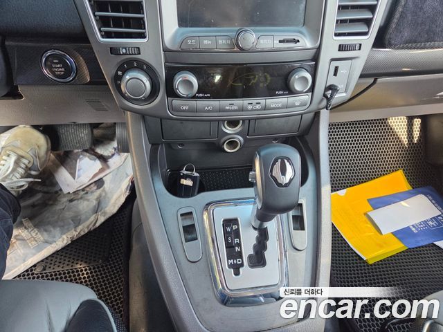 KG Mobility (SsangYong) Korando Turismo 4WD GT 11-seater 2014 — фото 10