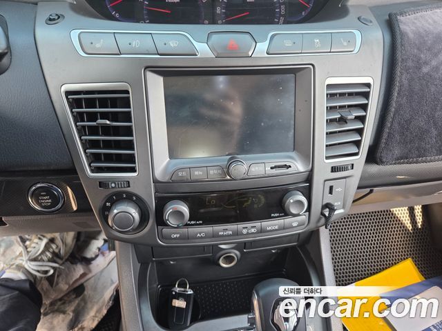 KG Mobility (SsangYong) Korando Turismo 4WD GT 11-seater 2014 — фото 16