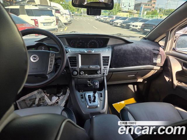 KG Mobility (SsangYong) Korando Turismo 4WD GT 11-seater 2014 — фото 17