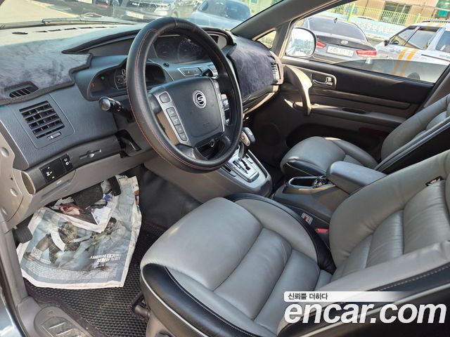 KG Mobility (SsangYong) Korando Turismo 4WD GT 11-seater 2014 — фото 18