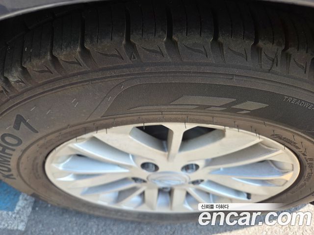 KG Mobility (SsangYong) Korando Turismo 4WD GT 11-seater 2014 — фото 23