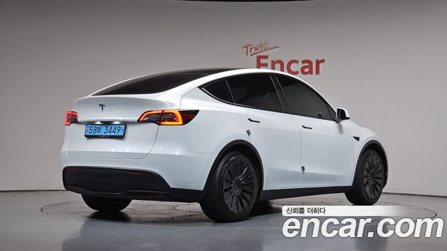 Tesla Model Y RWD 2024 — фото 2