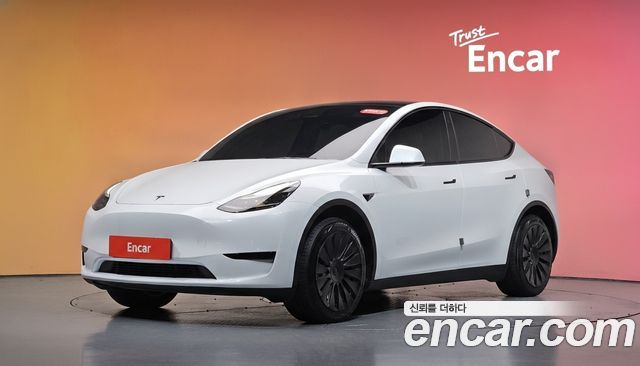 Tesla Model Y RWD 2024 — фото 1