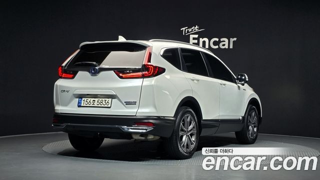 Honda CR-V (V) 2.0 Hybrid Touring 4WD 2021 — фото 2