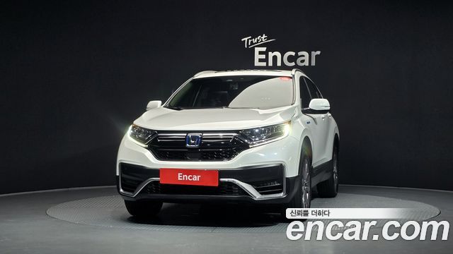 Honda CR-V (V) 2.0 Hybrid Touring 4WD 2021 — фото 3