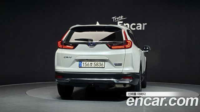 Honda CR-V (V) 2.0 Hybrid Touring 4WD 2021 — фото 4