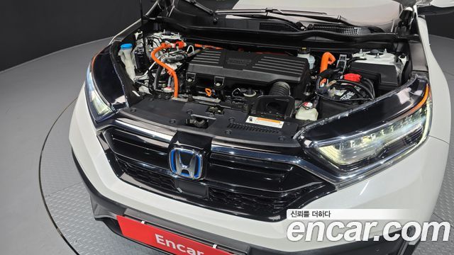 Honda CR-V (V) 2.0 Hybrid Touring 4WD 2021 — фото 6