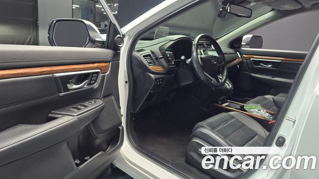Honda CR-V (V) 2.0 Hybrid Touring 4WD 2021 — фото 10