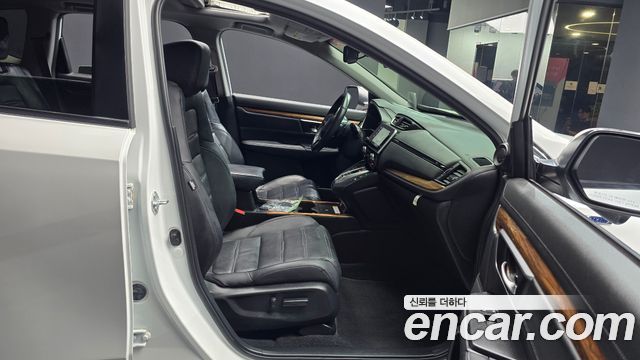 Honda CR-V (V) 2.0 Hybrid Touring 4WD 2021 — фото 11