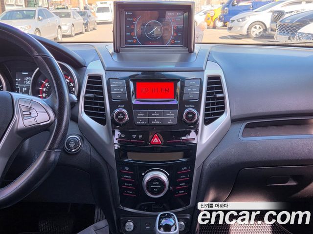 KG Mobility (SsangYong) Tivoli VX 2WD 2015 — фото 19