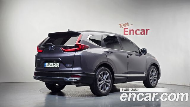 Honda CR-V (V) 2.0 Hybrid Touring 4WD 2021 — фото 2