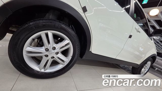 KG Mobility (SsangYong) Korando C 2.0 CVT 2WD Deluxe 2015 — фото 7