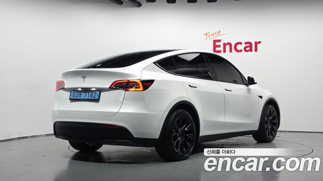 Tesla Model Y RWD 2024 — фото 2
