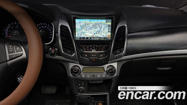 KG Mobility (SsangYong) Korando C 2.0 CVT 2WD Deluxe 2015 — фото 14