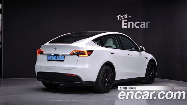 Tesla Model Y RWD 2024 — фото 2