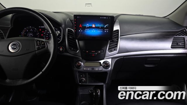KG Mobility (SsangYong) Korando C 2.0 CVT 2WD Deluxe 2014 — фото 14