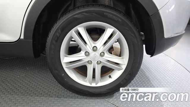 KG Mobility (SsangYong) Korando C 2.0 CVT 2WD Deluxe 2014 — фото 21